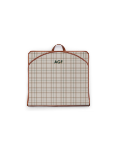 Closed view of the monogram garment bag showing a monogram stripe and initials