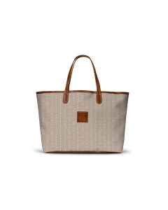 personalized tote bag, it has a leather trim and initials monogrammed on the tote with a leather patch, this particular one features the stone fawn design